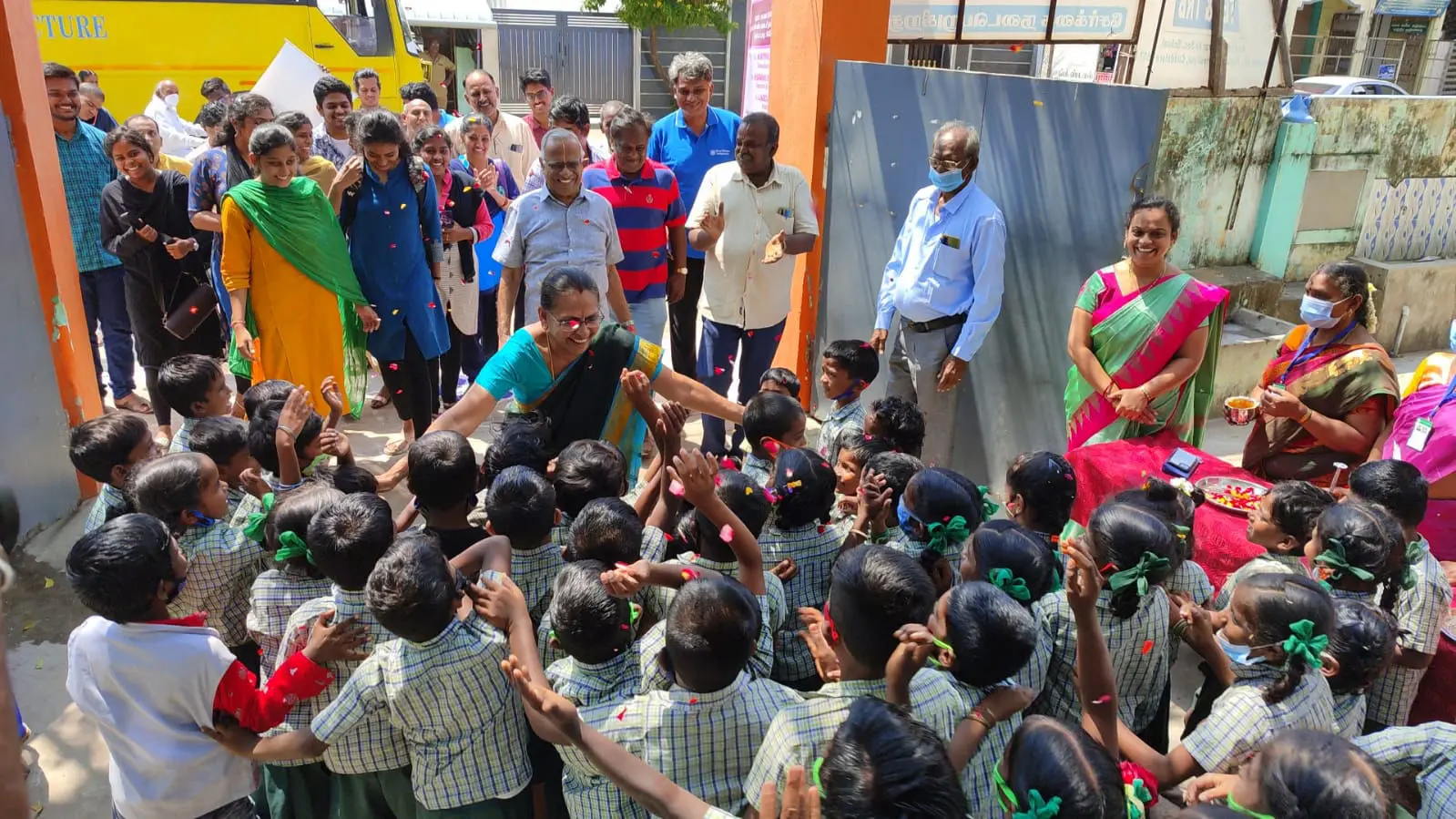 V V Charitable Trust volunteers interacting with school children during an educational outreach program in Tamil Nadu.